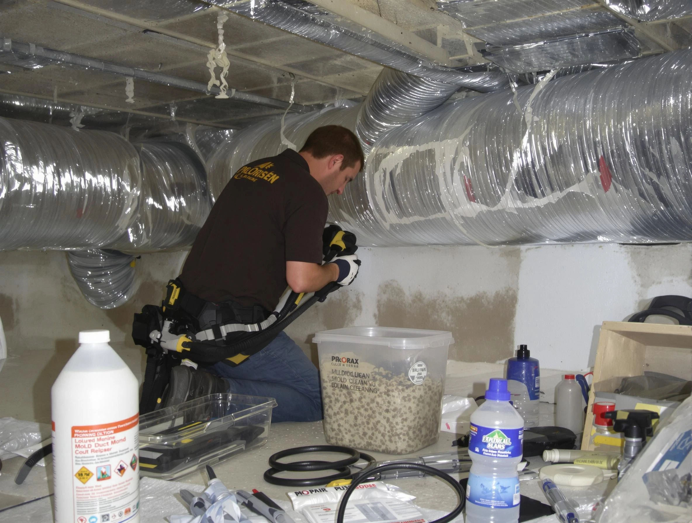 Erie Air Duct Cleaning specialist performing professional mold removal from air ducts in Erie